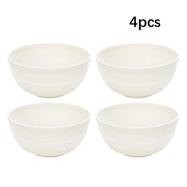 White plastic dinnerware set plate, bowl and cup