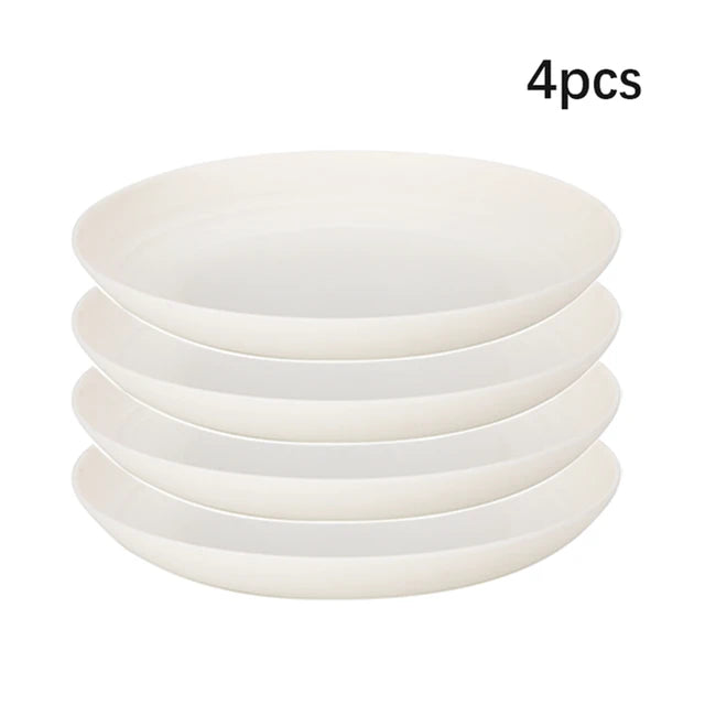 White plastic dinnerware set plate, bowl and cup