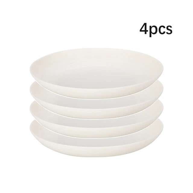 White plastic dinnerware set plate, bowl and cup