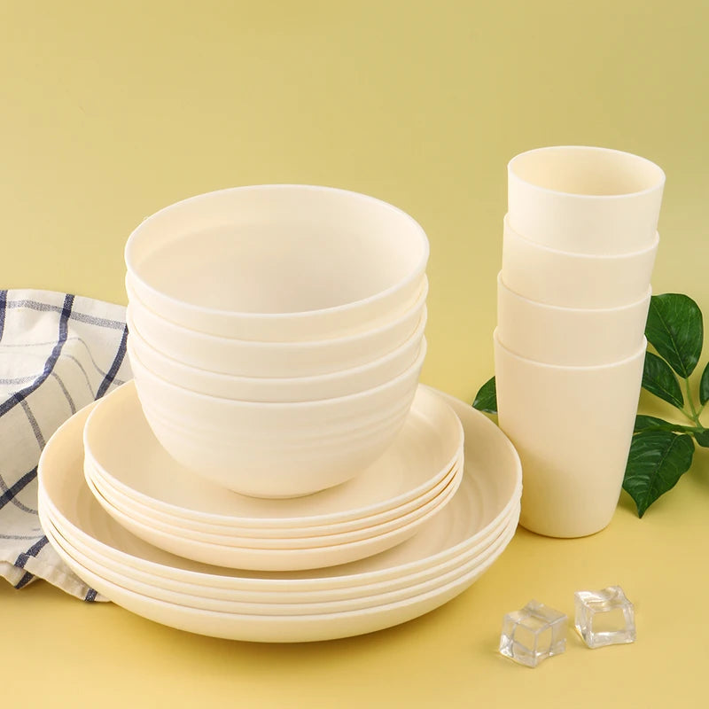 White plastic dinnerware set plate, bowl and cup